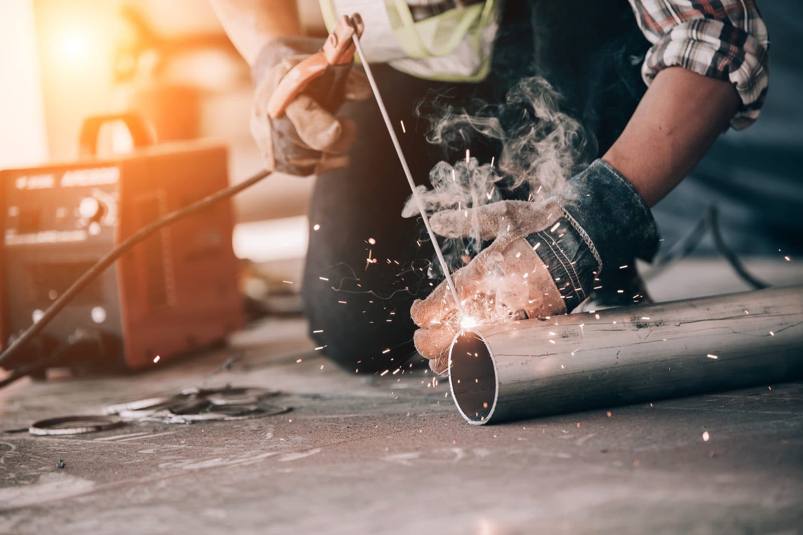 Industrial pipe welding, sparks flying